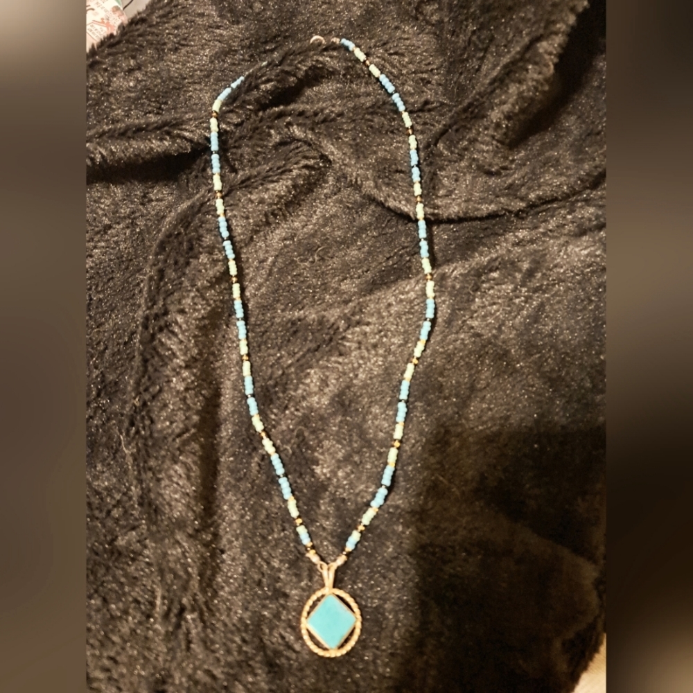 Glass Beads neclace with gold/turquoise pendant.